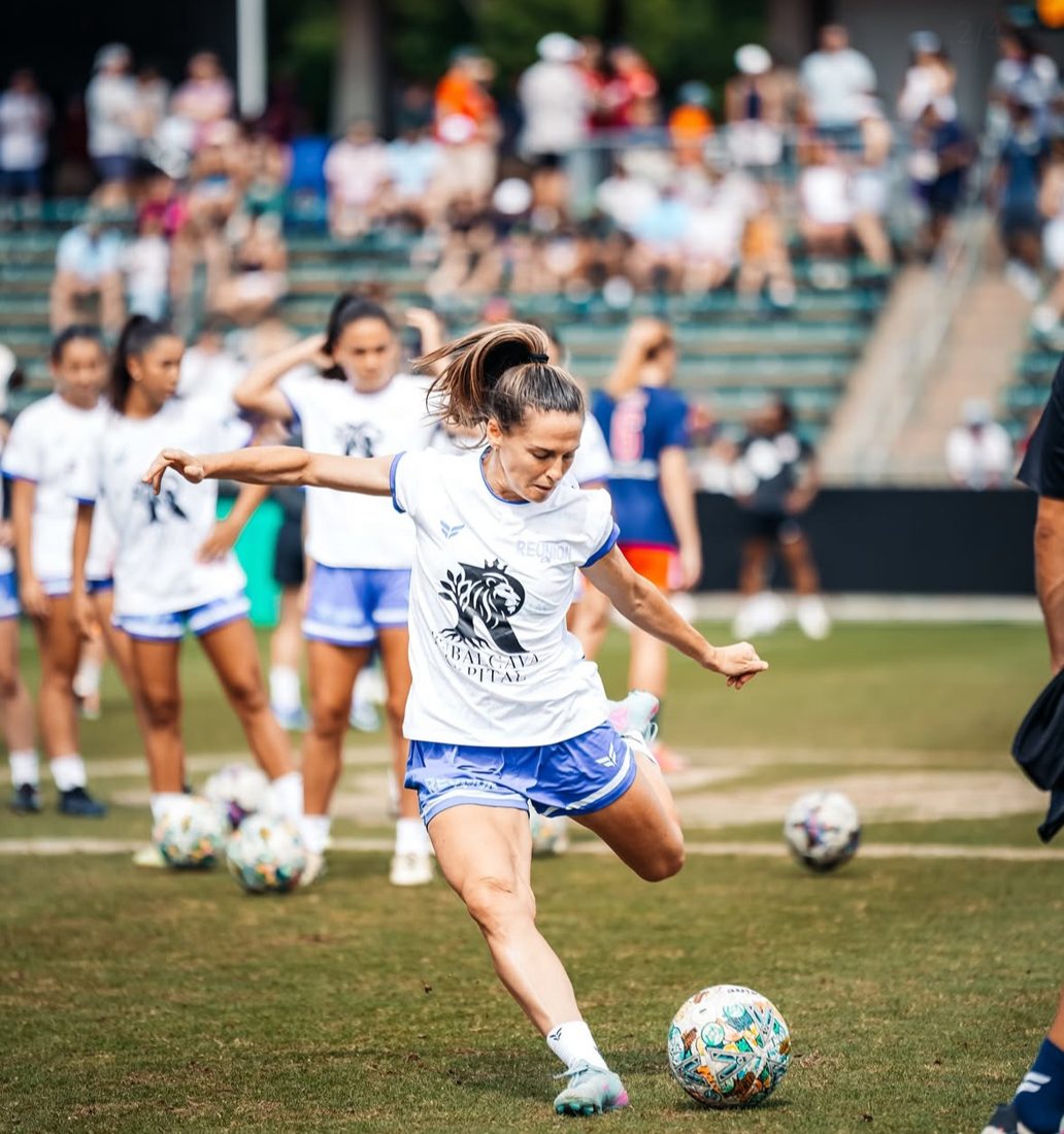 Hanna taking a shot during pre-game warm-up
